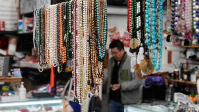 China lowers tax refund threshold for tourists in bid to boost consumer spending