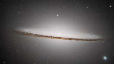 NASA’s Hubble Space Telescope marks 35 years with a captivating new view of the Sombrero Galaxy’s hat-like structure |