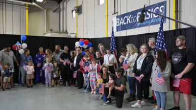 First batch of white South African refugees land in US as Trump cites ‘racial discrimination’