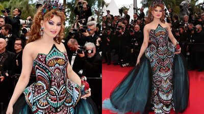 Pass or fail? Urvashi Rautela’s bold look with parrot clutch at Cannes 2025