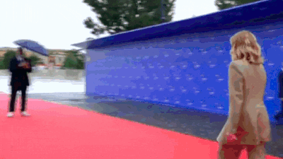 Watch: Albanian PM puts aside his umbrella, kneels in front of Georgina Meloni in Turin