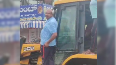 Bengaluru Rains: BJP MLA uses JCB vehicle to navigate flooded streets in Sai Layout | Bengaluru News