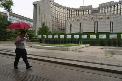 China’s central bank cut interest rates to record lows to revive grappling economy