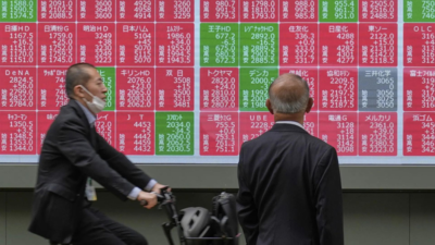 Asian shares edge lower as US markets closed for Memorial Day
