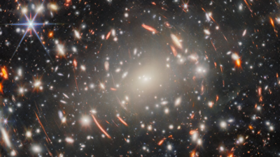 Glowing streaks of light and warped arcs: Nasa gives glimpse at ‘distant past’ through new Webb picture